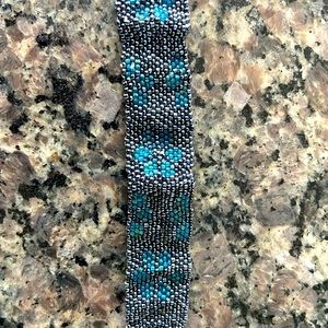 Two wide fancy delica Bracelets